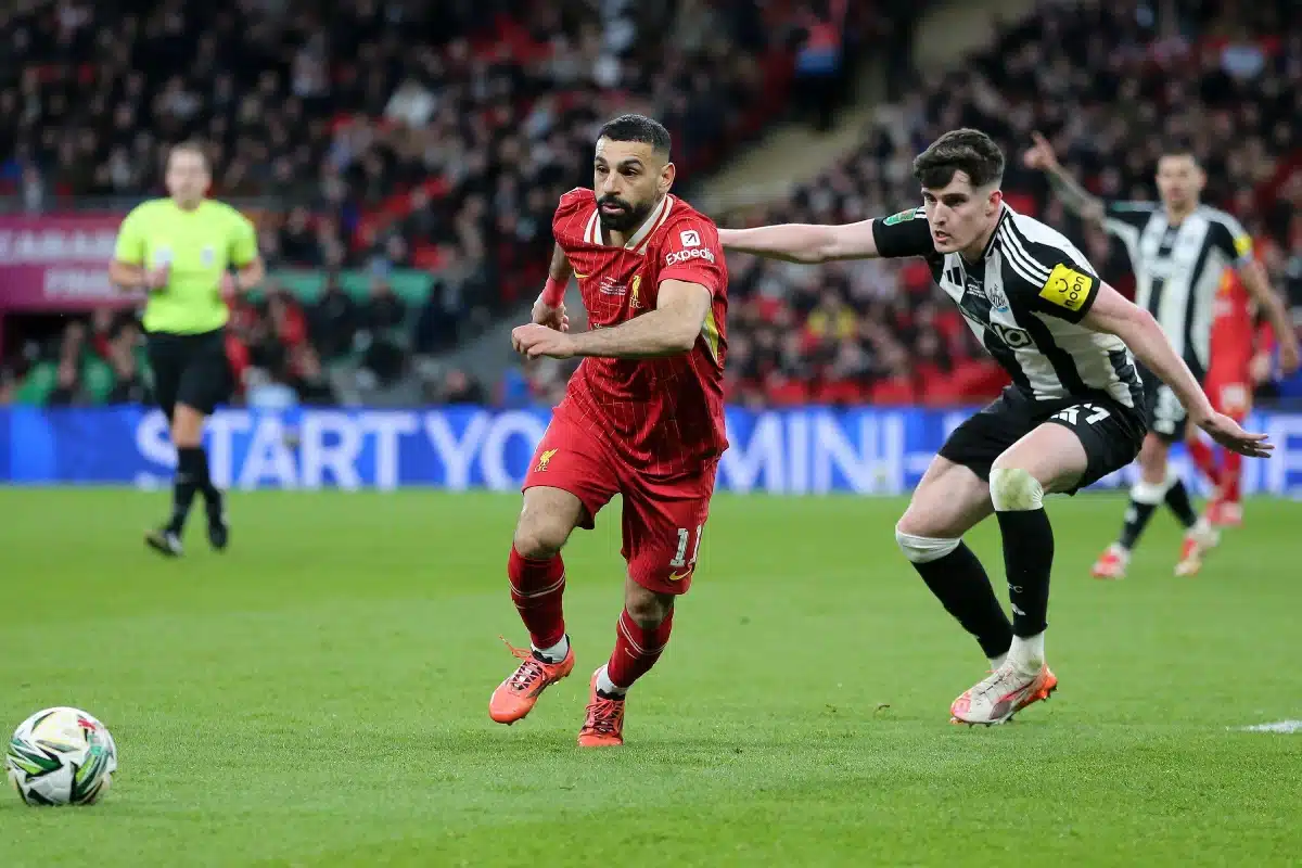 Mohamed Salah of Liverpool and Tino Livramento of Newcastle United in action. Carabao Cup final 2025